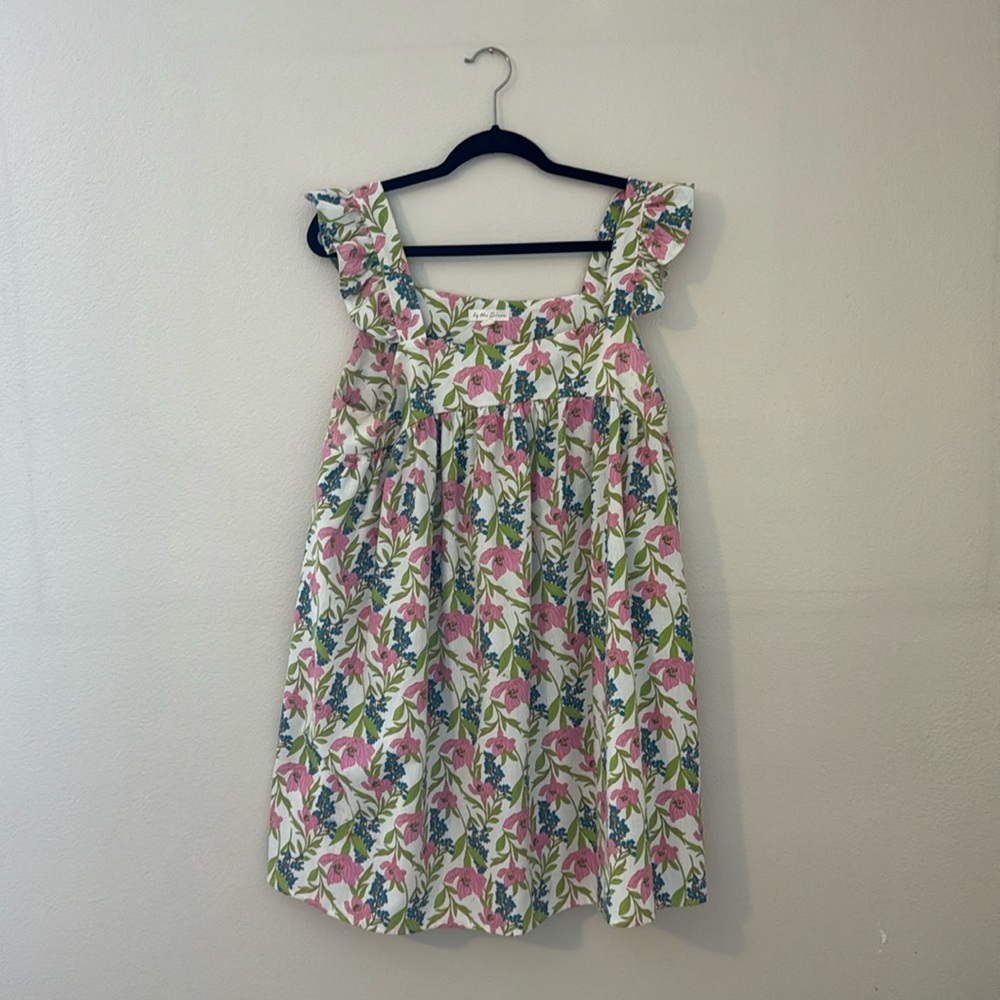 Cute spring dress. By the River. Fits really nice.